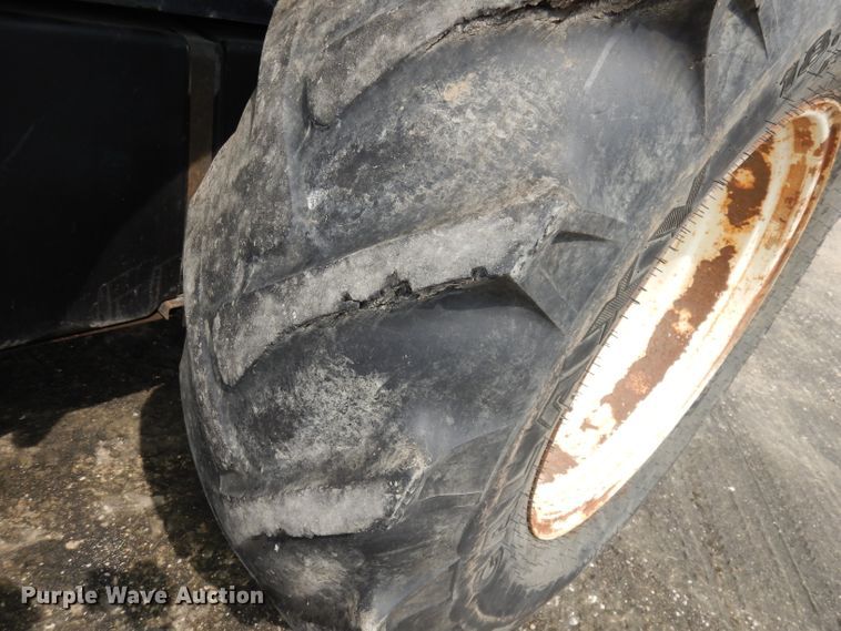 image for item DJ6774 1999 New Holland TS100  tractor