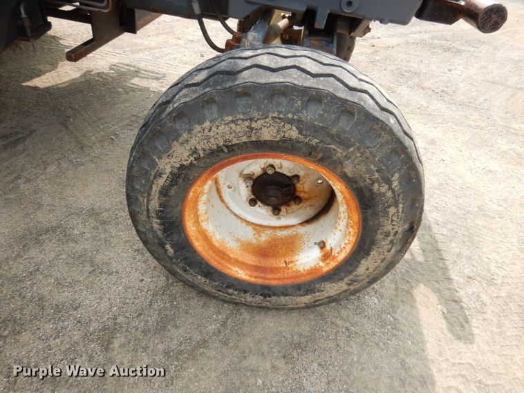 image for item DJ6775 2001 New Holland TS100  tractor