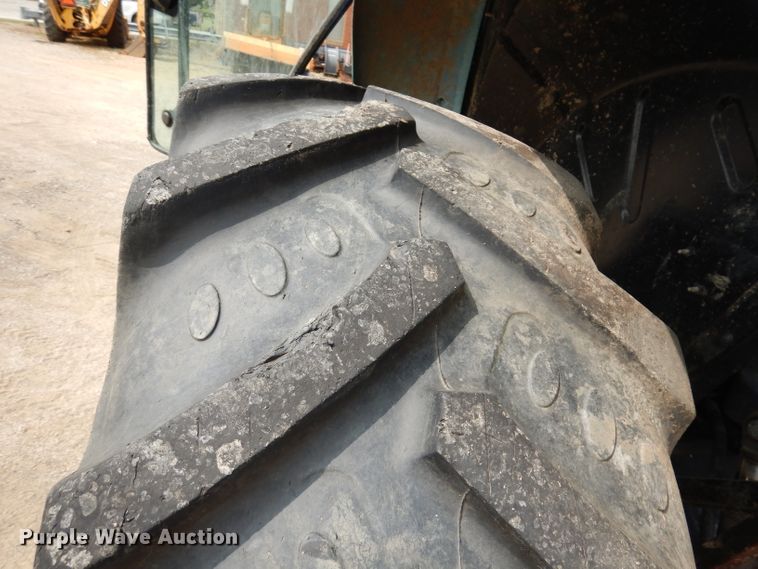 image for item DJ6775 2001 New Holland TS100  tractor