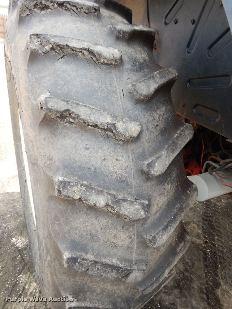 image for item DJ6789 1999 New Holland TS100  tractor