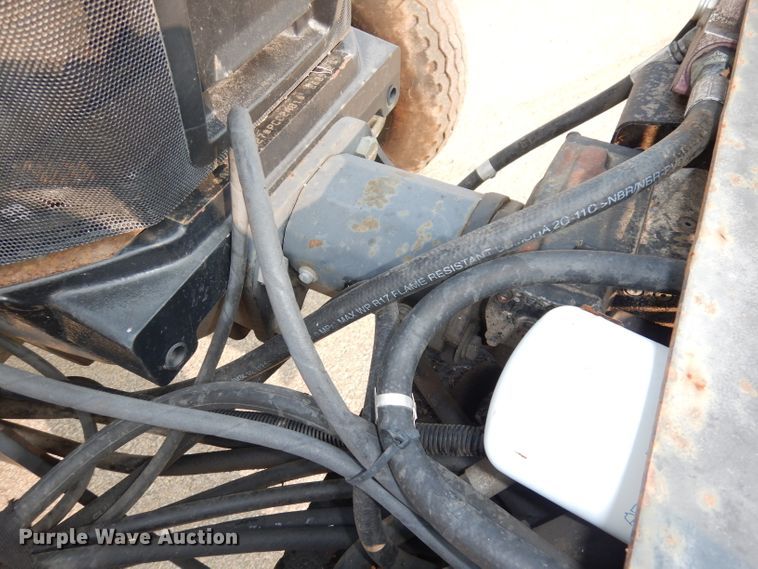 image for item DJ6791 2004 New Holland TS115A  tractor