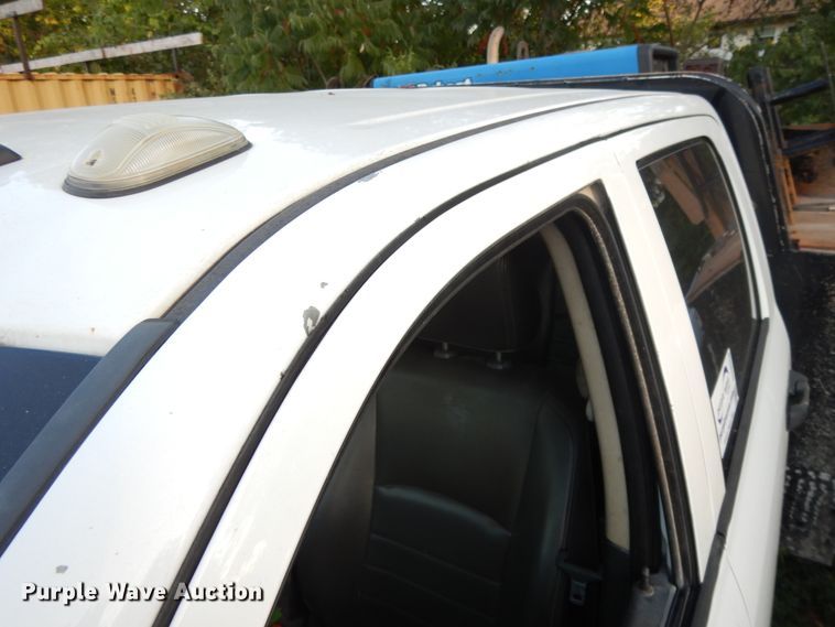 image for item DH0058 2013 Dodge Ram 5500HD  Crew Cab flatbed truck