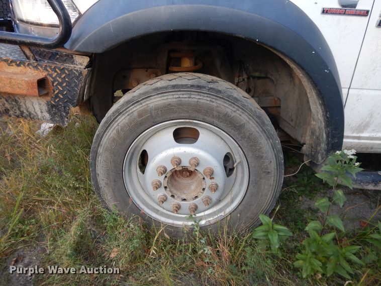 image for item DH0058 2013 Dodge Ram 5500HD  Crew Cab flatbed truck