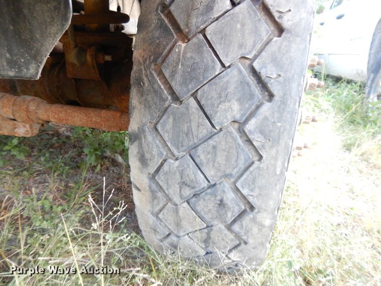 image for item DH0058 2013 Dodge Ram 5500HD  Crew Cab flatbed truck