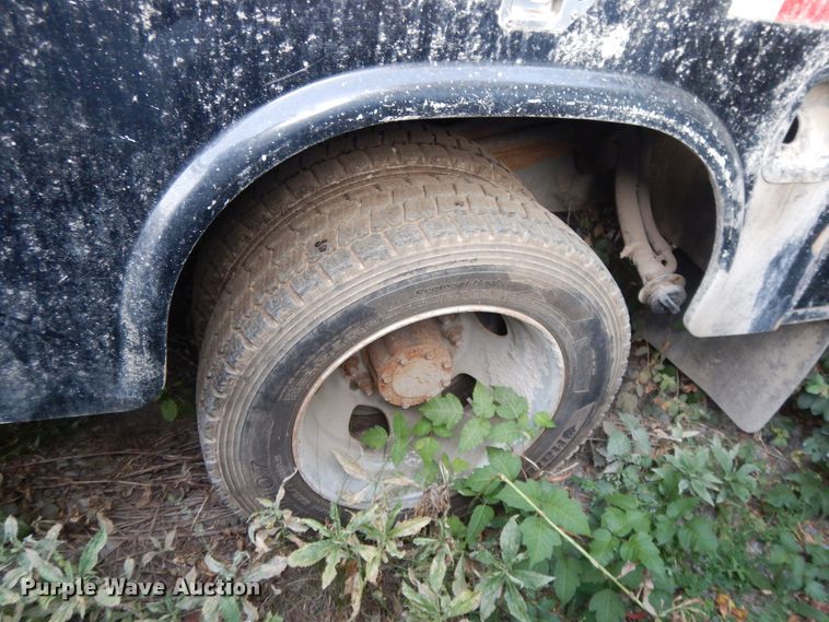 image for item DH0058 2013 Dodge Ram 5500HD  Crew Cab flatbed truck