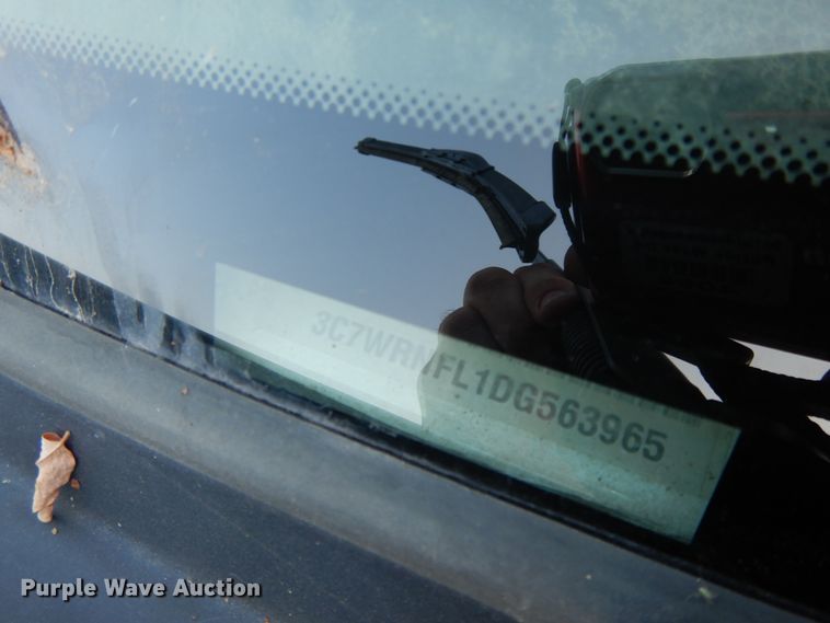 image for item DH0058 2013 Dodge Ram 5500HD  Crew Cab flatbed truck