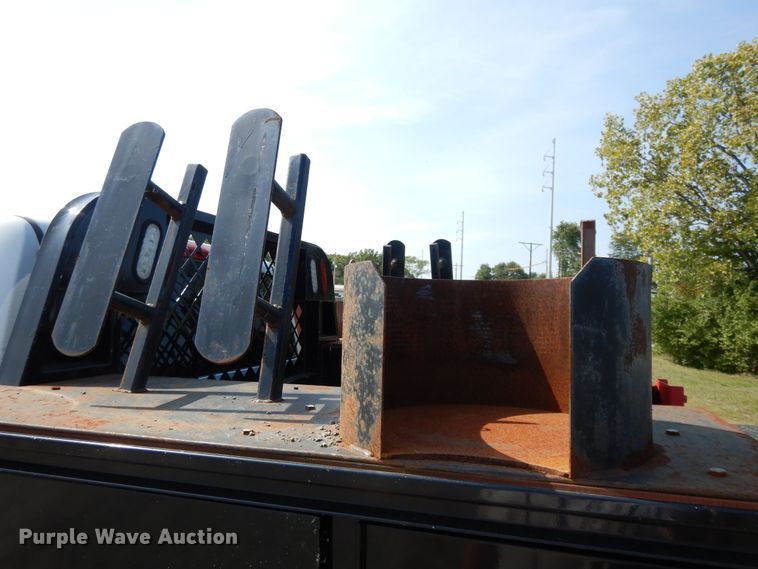 image for item DH0067 2014 Dodge Ram 5500HD  Crew Cab flatbed truck