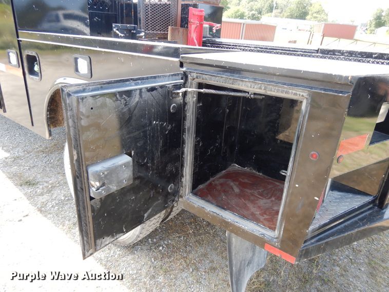 image for item DH0067 2014 Dodge Ram 5500HD  Crew Cab flatbed truck