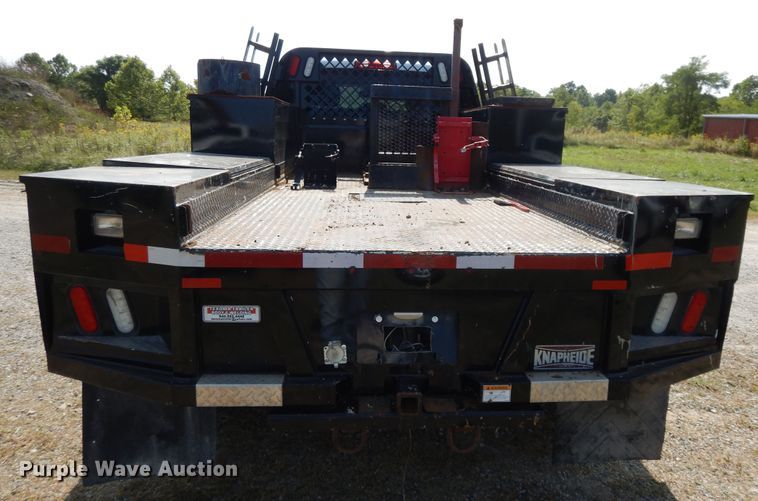 image for item DH0067 2014 Dodge Ram 5500HD  Crew Cab flatbed truck