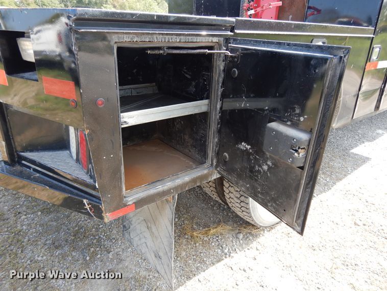 image for item DH0067 2014 Dodge Ram 5500HD  Crew Cab flatbed truck