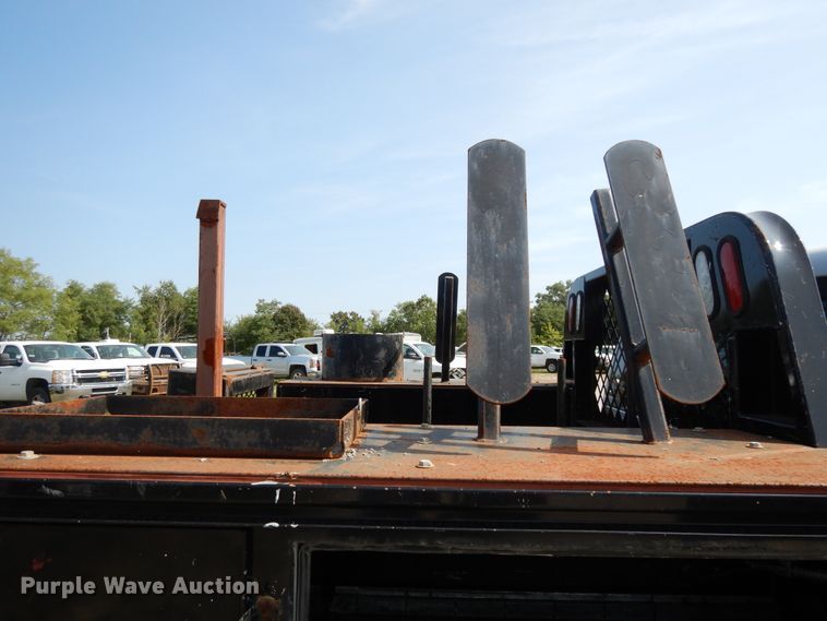 image for item DH0067 2014 Dodge Ram 5500HD  Crew Cab flatbed truck