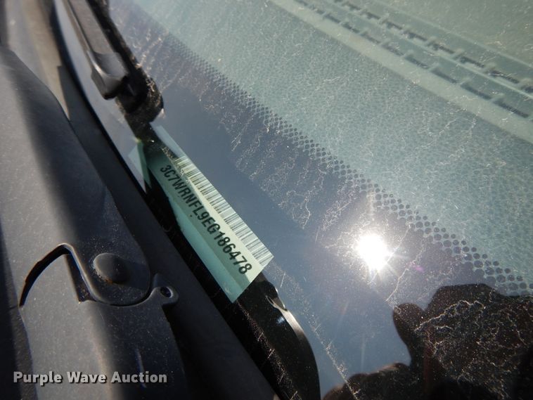 image for item DH0067 2014 Dodge Ram 5500HD  Crew Cab flatbed truck