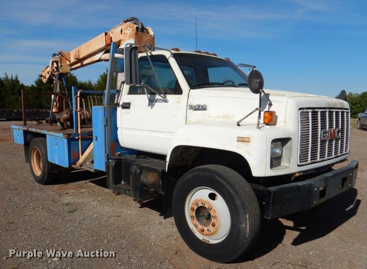image for item DI0447 1994 GMC TopKick C5500  digger derrick truck