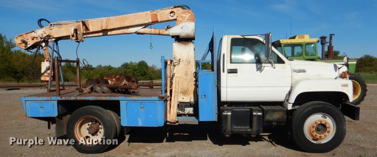 image for item DI0447 1994 GMC TopKick C5500  digger derrick truck