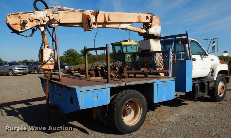 image for item DI0447 1994 GMC TopKick C5500  digger derrick truck