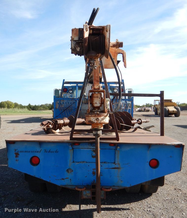 image for item DI0447 1994 GMC TopKick C5500  digger derrick truck