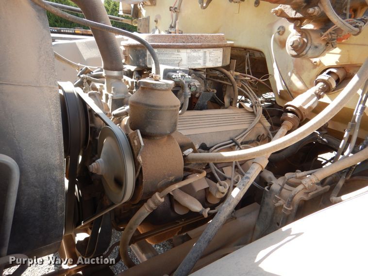 image for item DI0447 1994 GMC TopKick C5500  digger derrick truck