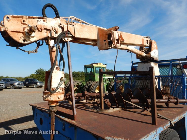 image for item DI0447 1994 GMC TopKick C5500  digger derrick truck