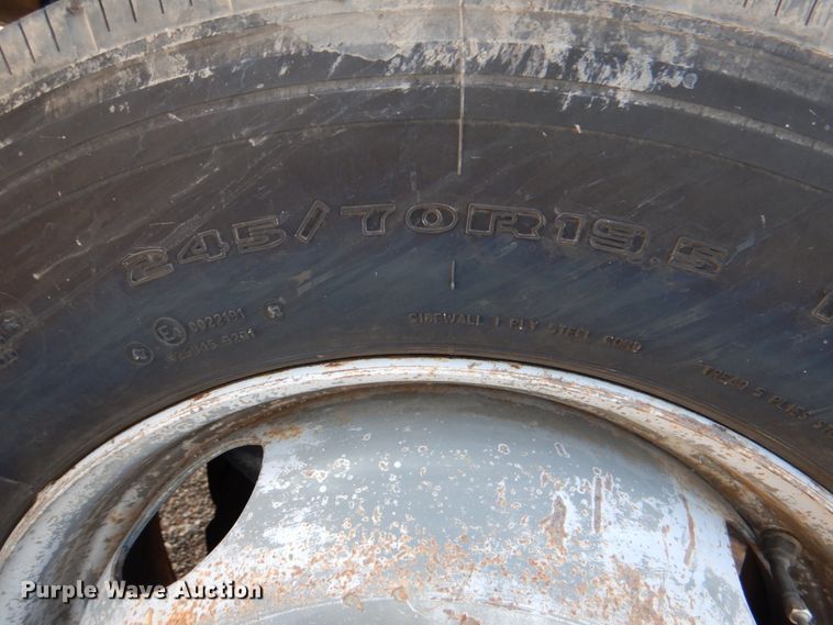 image for item DI0448 1999 GMC C6500  winch truck