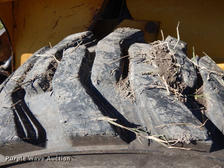 image for item HN9304 John Deere 8875  skid steer loader