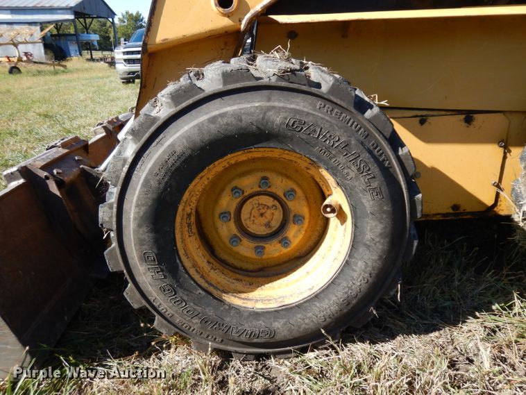 image for item HN9304 John Deere 8875  skid steer loader