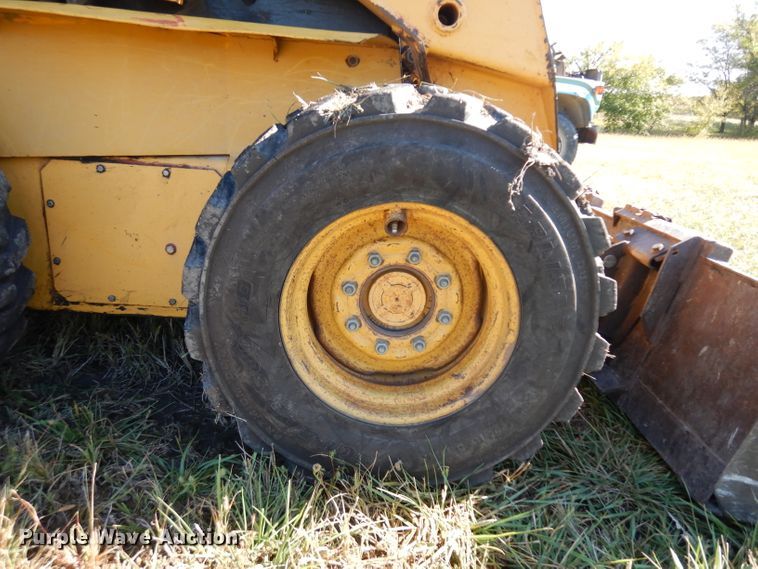 image for item HN9304 John Deere 8875  skid steer loader