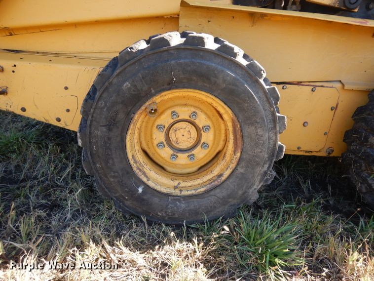 image for item HN9304 John Deere 8875  skid steer loader