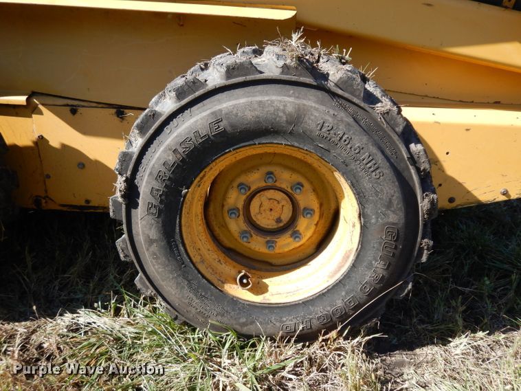 image for item HN9304 John Deere 8875  skid steer loader