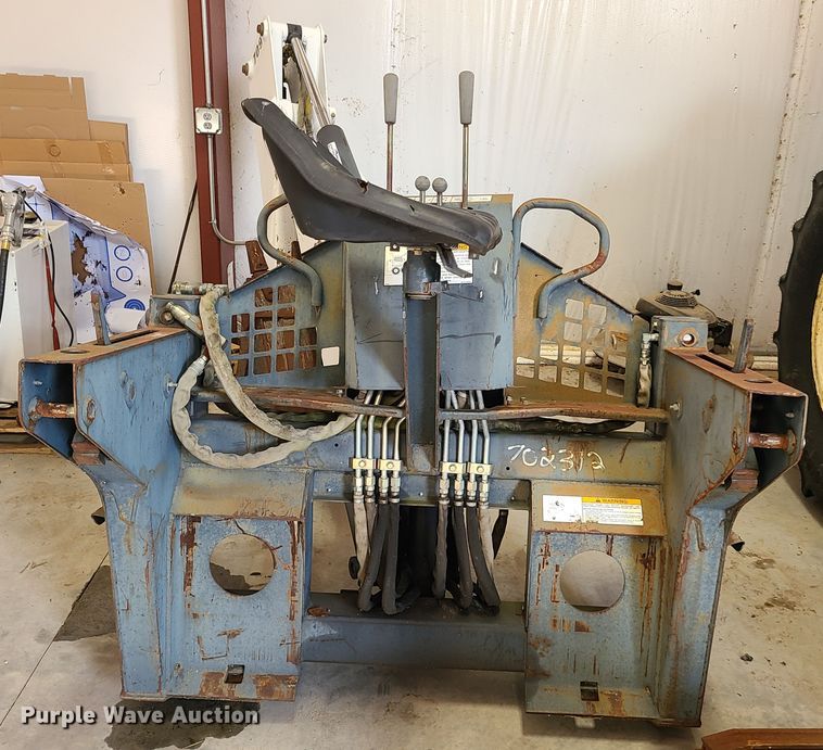 image for item DY9979 Bobcat 709 skid steer backhoe attachment