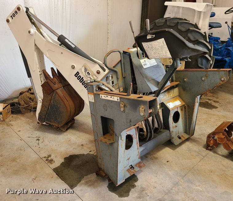 image for item DY9979 Bobcat 709 skid steer backhoe attachment