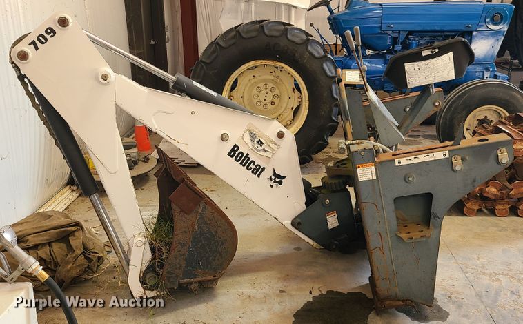 image for item DY9979 Bobcat 709 skid steer backhoe attachment