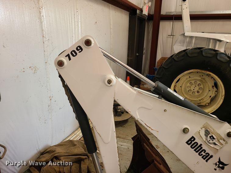 image for item DY9979 Bobcat 709 skid steer backhoe attachment