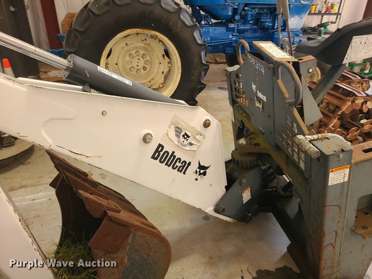 image for item DY9979 Bobcat 709 skid steer backhoe attachment