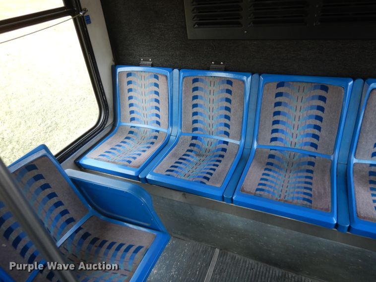 image for item HN9384 2001 Gillig G27B102N4  shuttle bus