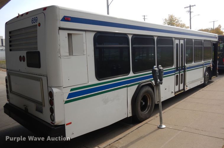 image for item HN9387 2001 Gillig G27B102N4  shuttle bus