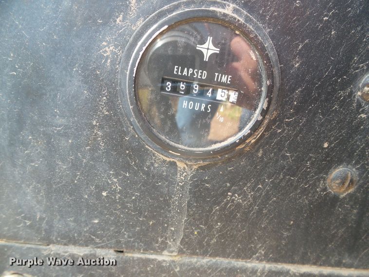 image for item DG8303 New Holland 1100  windrower