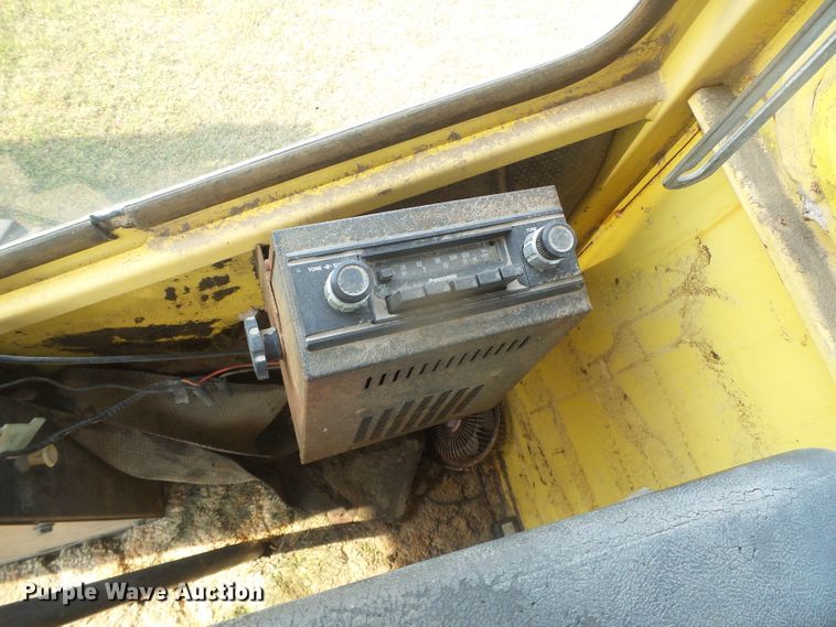 image for item DG8303 New Holland 1100  windrower