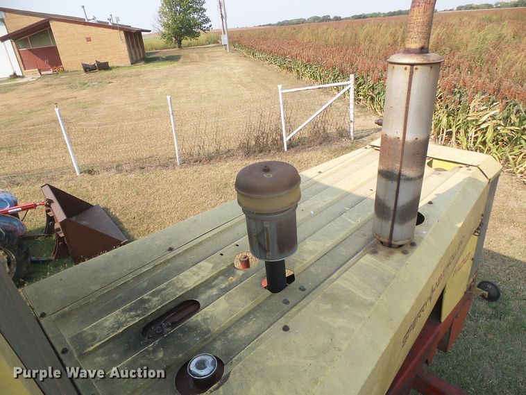 image for item DG8303 New Holland 1100  windrower