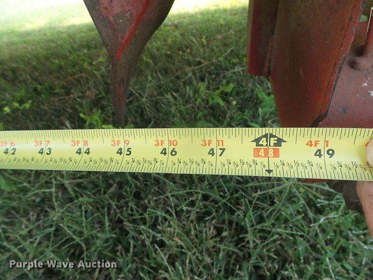 image for item DG8303 New Holland 1100  windrower