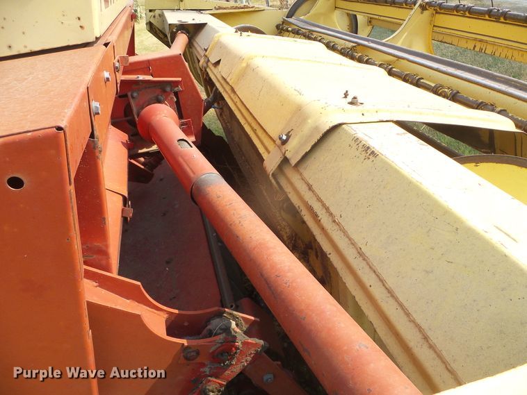 image for item DG8303 New Holland 1100  windrower