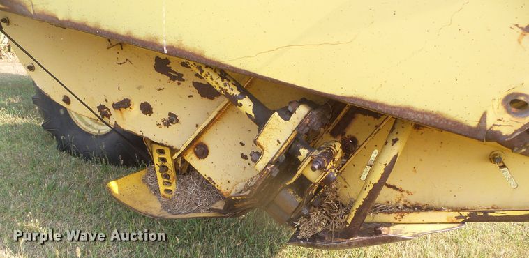image for item DG8303 New Holland 1100  windrower