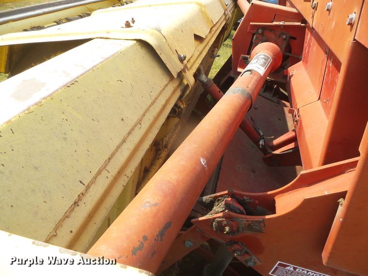 image for item DG8303 New Holland 1100  windrower