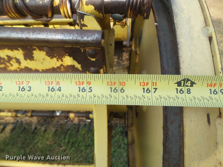 image for item DG8303 New Holland 1100  windrower