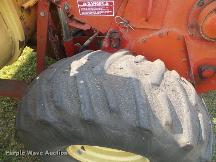 image for item DG8303 New Holland 1100  windrower