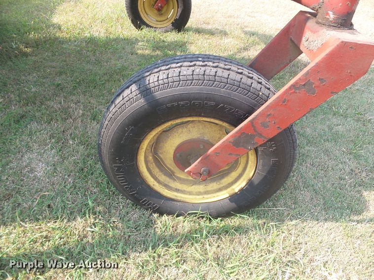 image for item DG8303 New Holland 1100  windrower