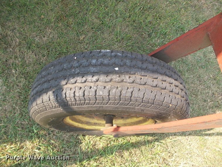 image for item DG8303 New Holland 1100  windrower