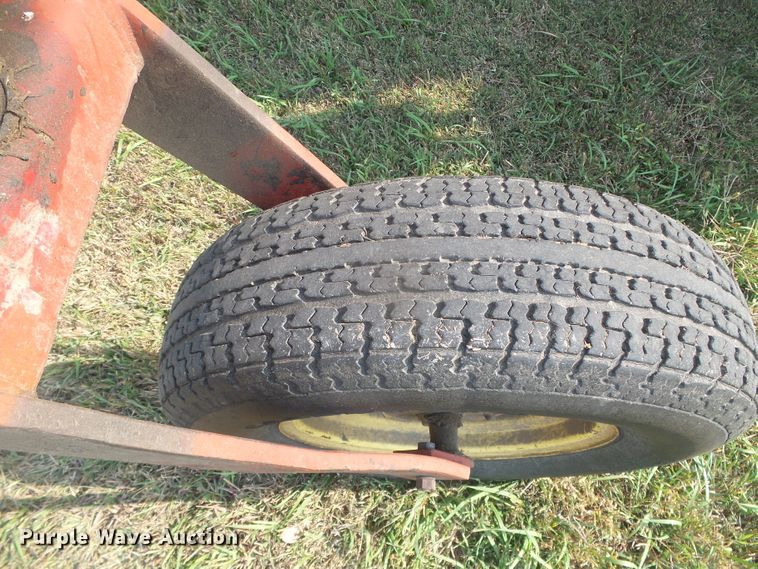 image for item DG8303 New Holland 1100  windrower