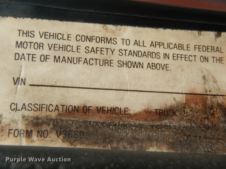 image for item HJ9735 1987 White WCM  fertilizer delivery truck