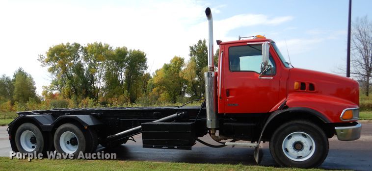 image for item AF9955 1999 Sterling L-Line  roll off container truck
