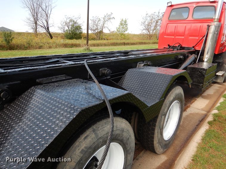 image for item AF9955 1999 Sterling L-Line  roll off container truck